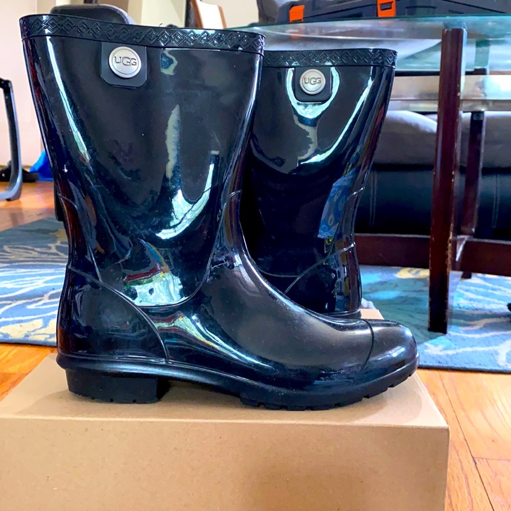 UGG fur lined, black leather rain boots.